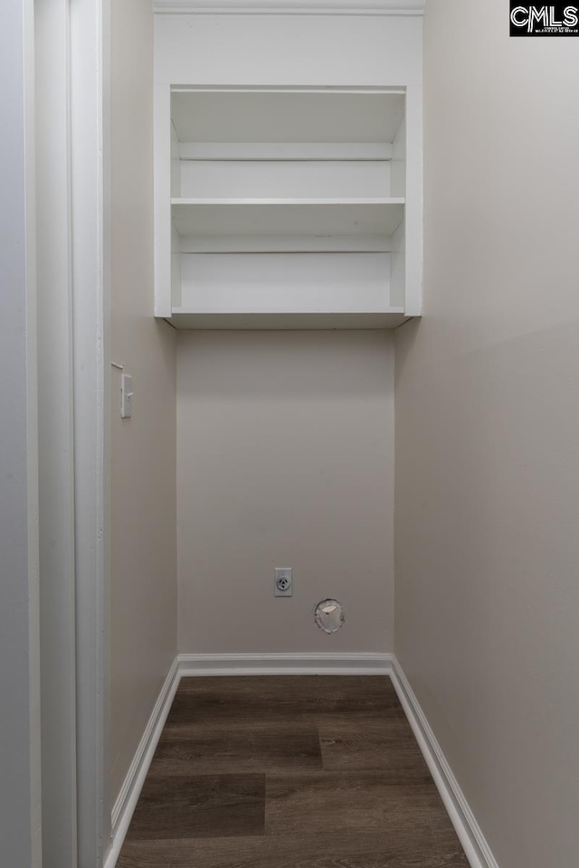 laundry area with dark wood-type flooring and hookup for an electric dryer