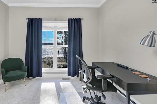 office area with crown molding and light carpet