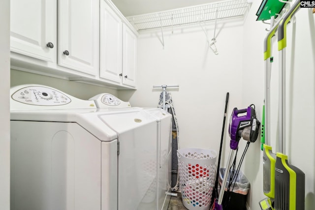 laundry area featuring cabinets and washer and dryer