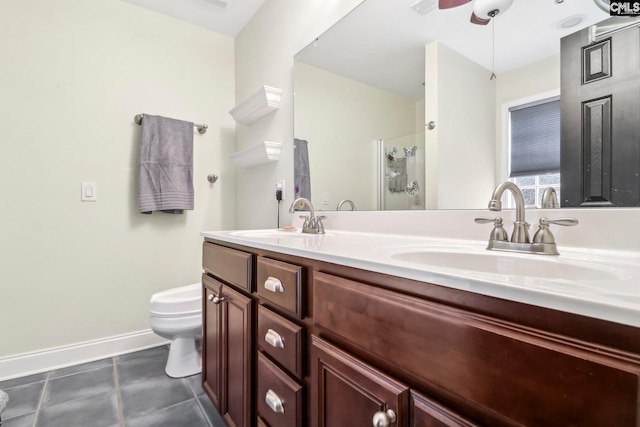 bathroom featuring ceiling fan, an enclosed shower, vanity, tile patterned floors, and toilet