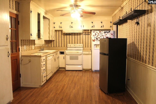 kitchen with white appliances, ornamental molding, sink, and white cabinets