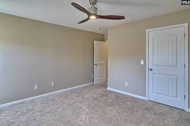 unfurnished bedroom featuring light colored carpet and ceiling fan