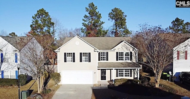 view of front of property featuring a garage