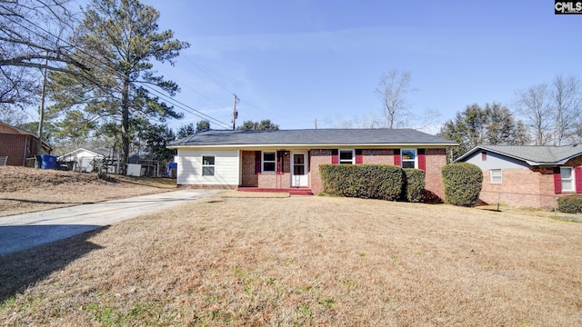 ranch-style home with a front lawn