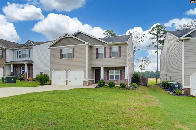 view of front of property with a garage and a front yard