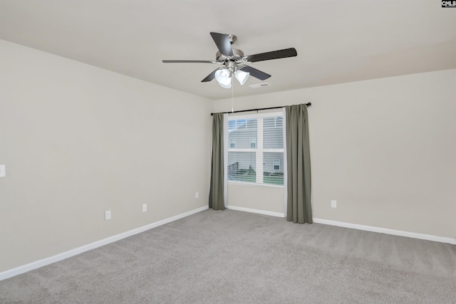 carpeted empty room with ceiling fan