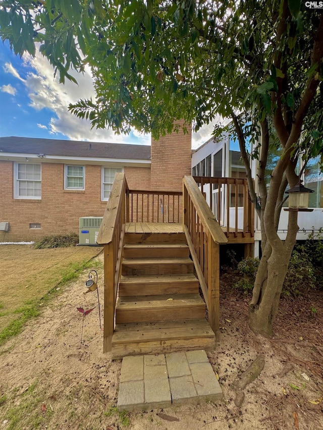 exterior space featuring a wooden deck