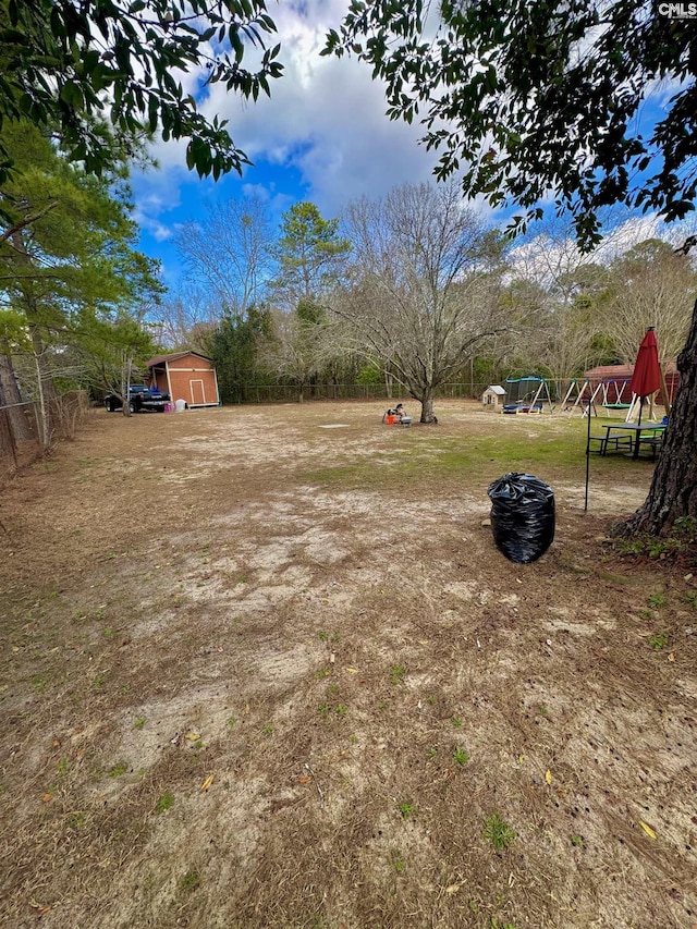 view of yard with a shed