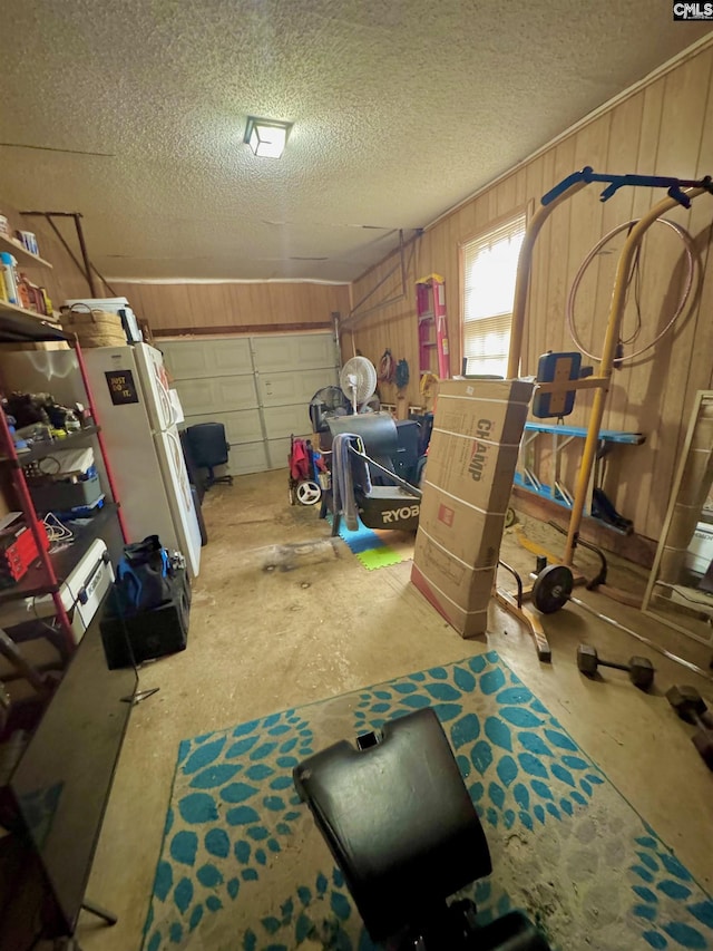 garage with wood walls