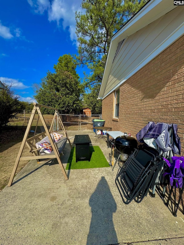 view of yard with a patio and a playground