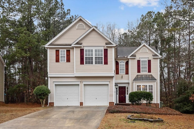 front of property with a garage