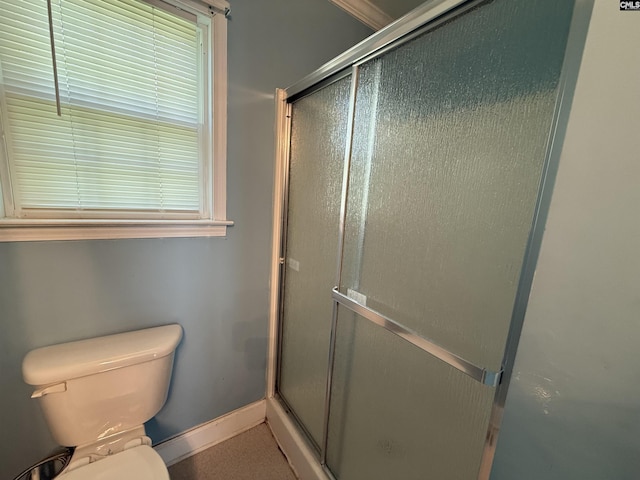 821 Crosson St, Newberry, SC 29108 - full bathroom featuring toilet, a shower with door, and baseboards