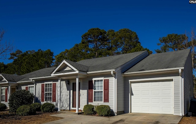 single story home with a garage