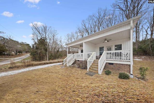 view of property exterior featuring ceiling fan and covered porch