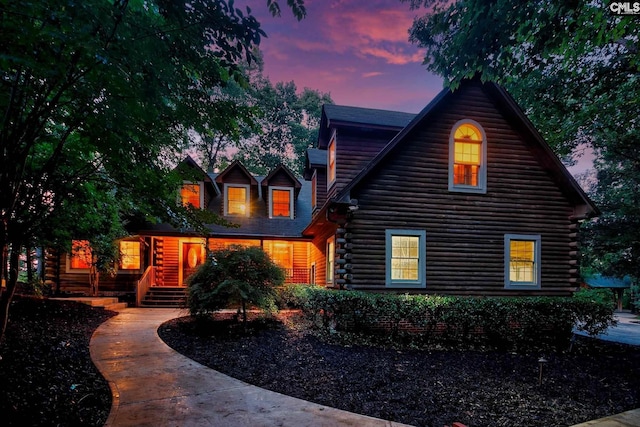 view of log cabin