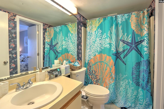 bathroom featuring vanity, walk in shower, tile patterned floors, and toilet