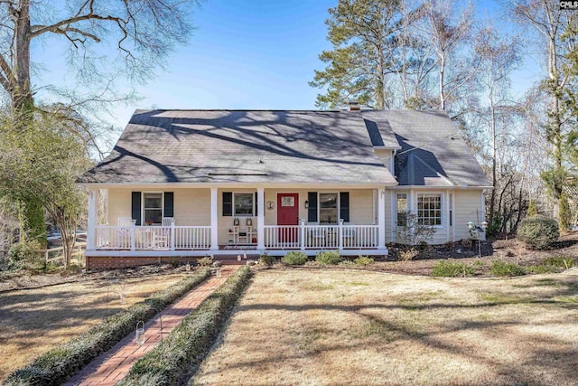 view of front of home featuring a porch and a front yard