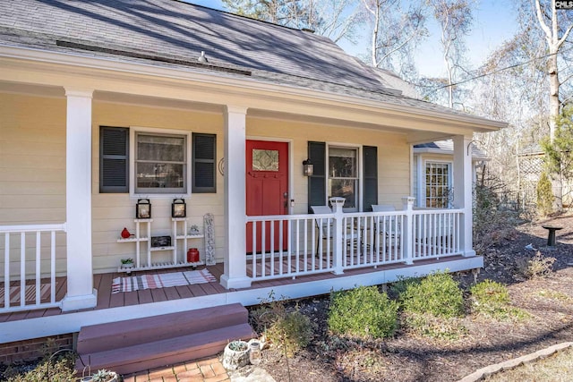 doorway to property with a porch