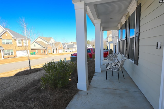 view of patio featuring a porch