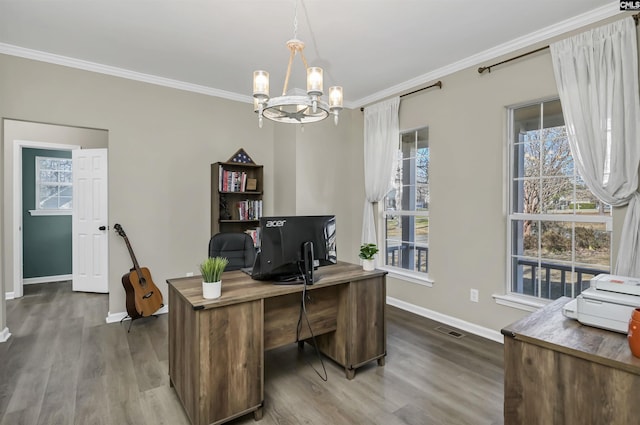 home office with a notable chandelier, crown molding, and dark wood-type flooring