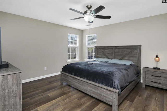 bedroom with dark wood-type flooring and ceiling fan