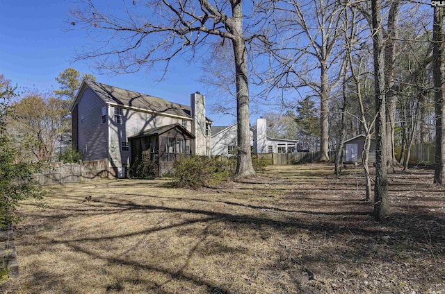 view of yard with a sunroom