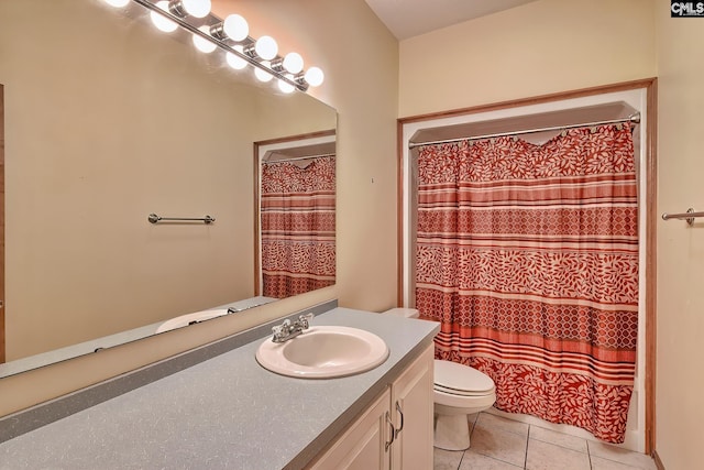 bathroom featuring a shower with shower curtain, vanity, toilet, and tile patterned flooring