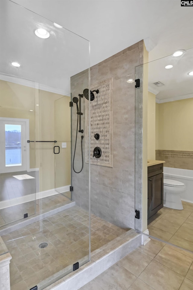 full bathroom with tile patterned flooring, crown molding, and shower with separate bathtub