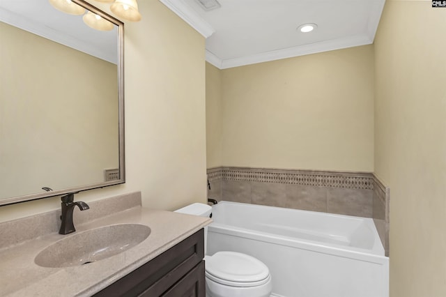 bathroom featuring vanity, a washtub, crown molding, and toilet