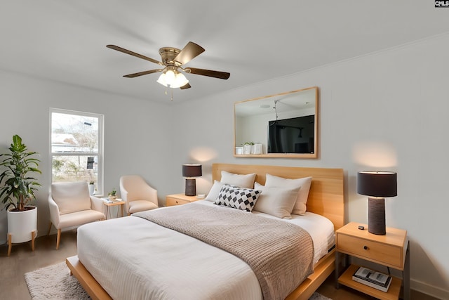 bedroom featuring dark wood-type flooring and ceiling fan