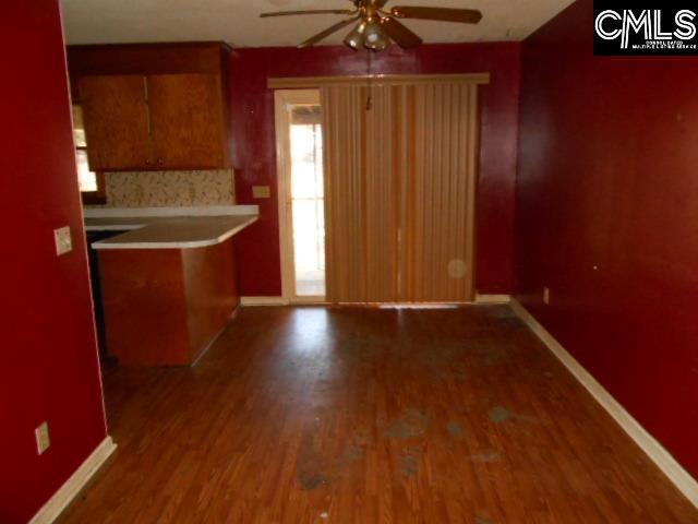 kitchen featuring hardwood / wood-style floors and ceiling fan