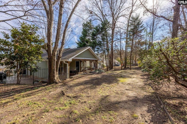 view of property exterior featuring a porch