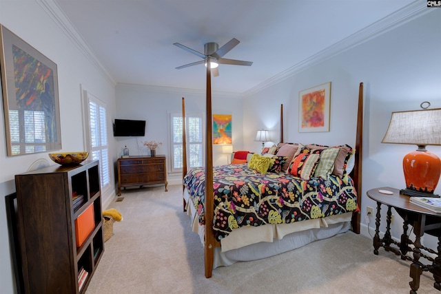 bedroom with crown molding, light colored carpet, and ceiling fan