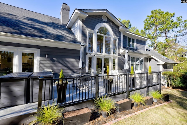 back of house featuring french doors