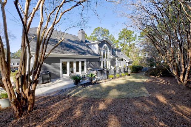 rear view of house with a patio area