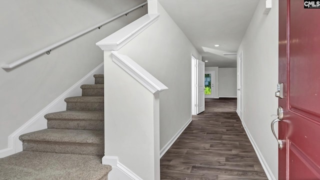 foyer with dark hardwood / wood-style flooring