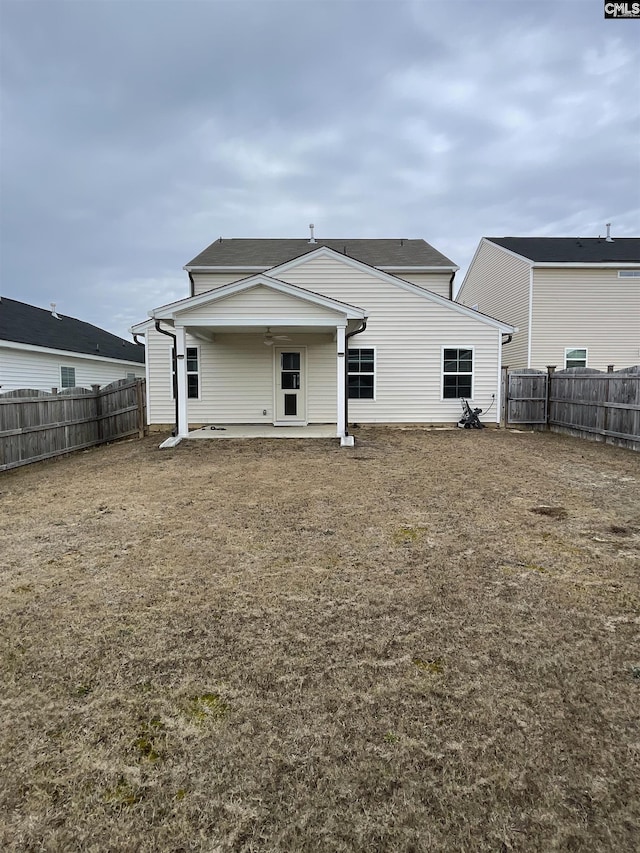 back of property featuring a patio area