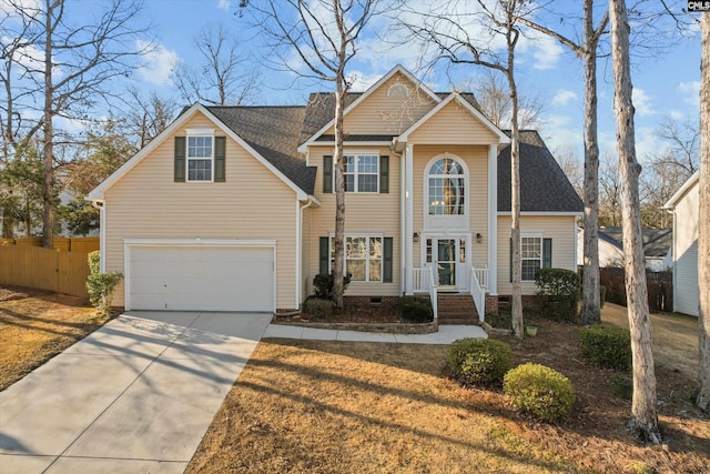 traditional-style house with concrete driveway, roof with shingles, fence, and crawl space