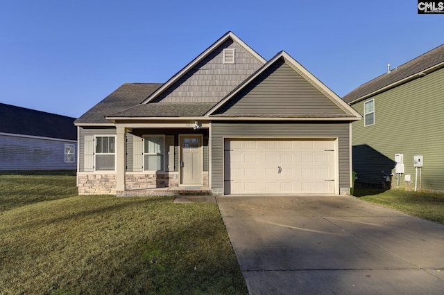 craftsman-style home with a garage, a front lawn, and a porch