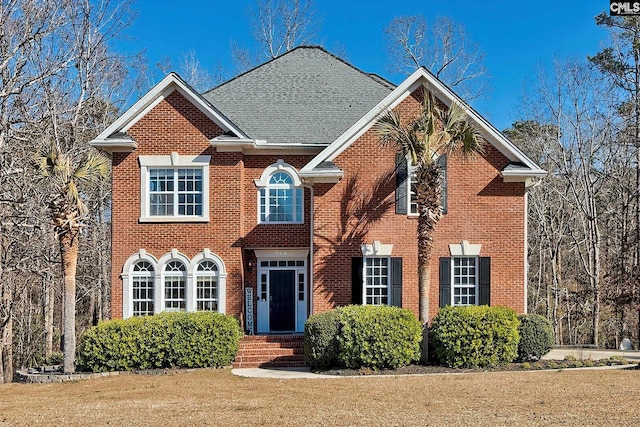 front of property with a front yard