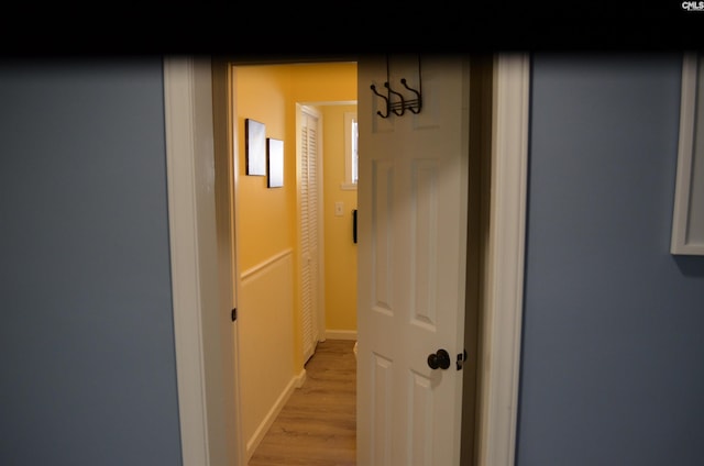 hall featuring light hardwood / wood-style flooring