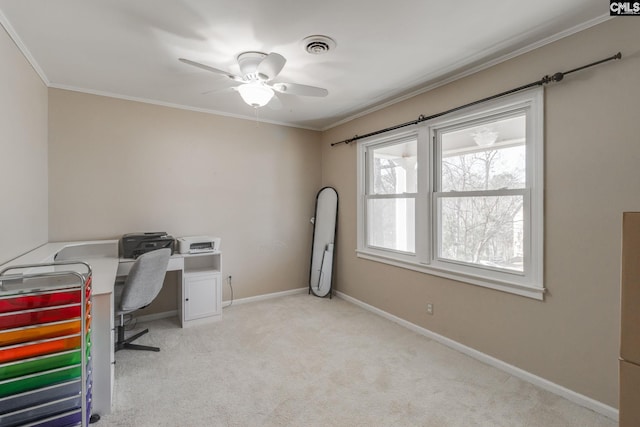 carpeted office space with crown molding and ceiling fan