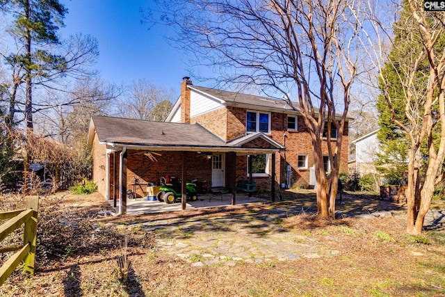 back of property featuring a patio