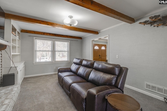 living room featuring crown molding, light colored carpet, beam ceiling, and a fireplace