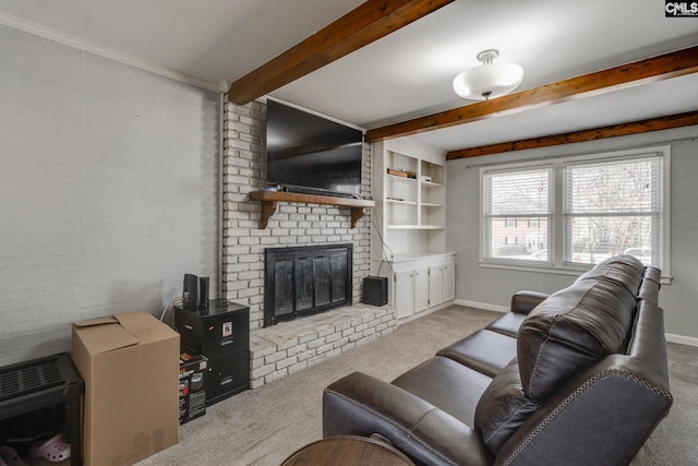 carpeted living room featuring beamed ceiling and a fireplace