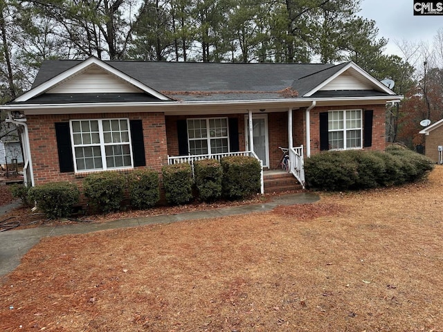 view of front of property featuring covered porch