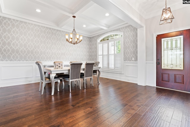 dining room featuring dark hardwood / wood-style floors, beamed ceiling, a chandelier, coffered ceiling, and crown molding