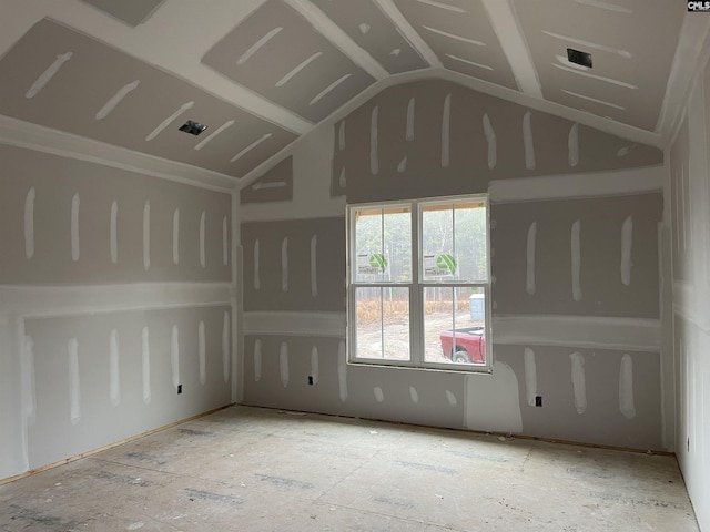 unfurnished room featuring lofted ceiling