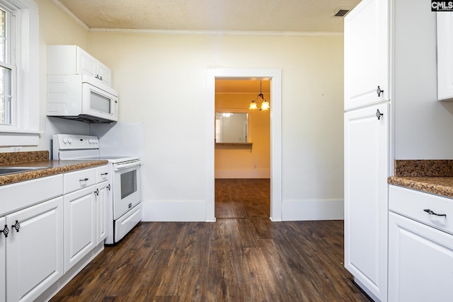 kitchen featuring white cabinetry, ornamental molding, white appliances, dark wood-type flooring, and a textured ceiling