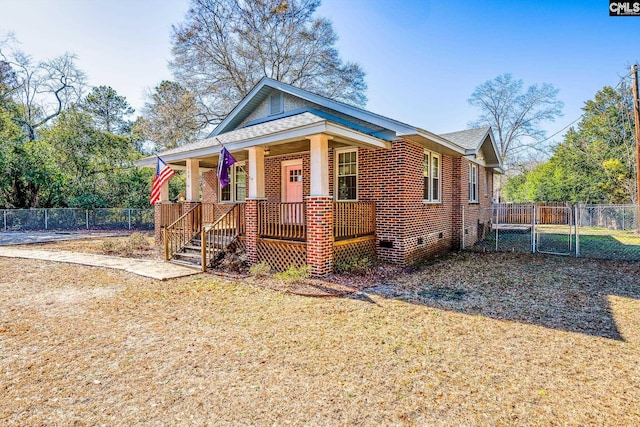 bungalow-style house featuring covered porch